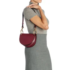 Consuelo Women's crossbody bag in leather color black cherry